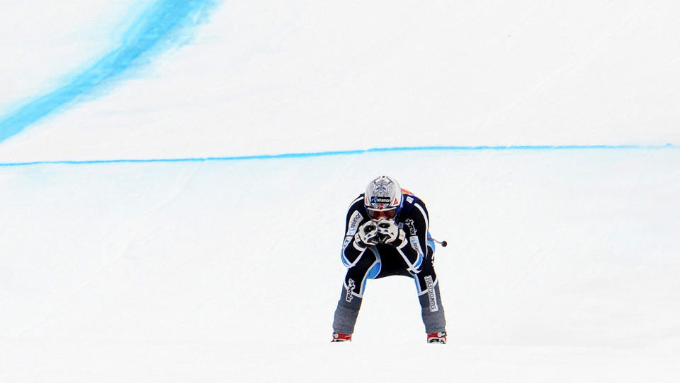 MOT M�L: Aksel Lund Svindal var bare dr�yt fire tideler bak Bode Miller p� treninga i dag. Foto: AP/Giovanni Auletta
