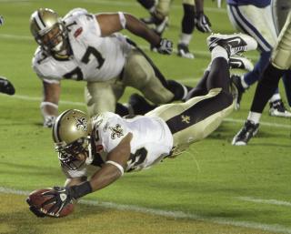 TOUCHDOWN: New Orleans Saints-spiller Pierre Thomas gj�r en touchdown. Foto: AP/Chuck Burton
