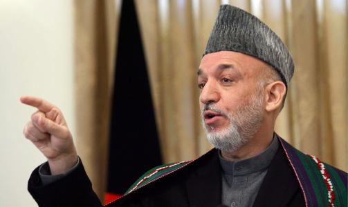 TILBAKEHOLDEN OG SKEPTISK: Afgahnistans president Hamid Karzai. Foto: EPA/S. SABAWOON/SCANPIX