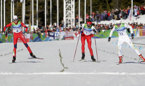 SL�TT MED EN SKOTUPP: Det var ikke mange centimeterne som skilte Kristin St�rmer Steira fra hennes f�rste OL-medalje. Tanav�ringen m�tte se seg sl�tt med en skotupp av Justyna Kowalczyk.Foto: SCANPIX/AP Photo/Elaine Thompson