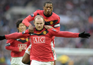 M�L NUMMER 28: Wayne Rooney fikk et perfekt innlegg fra Valencia. Foto: AFP/CARL DE SOUZA