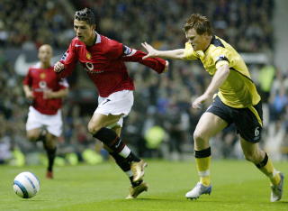 DUELL: Riise og Ronaldo m�ttes ofte da Ronaldo var Uniteds h�yreving og Riise Liverpools venstreback. Foto: REUTERS/Ian Hodgson