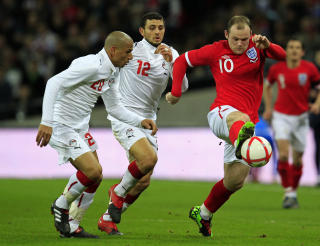 INGEN KJEMPEKAMP: Men null scoringer til tross, Wayne Rooney viste at han er Englands spissvalg nummer �n. Foto: Eddie Keogh  / REUTERS.