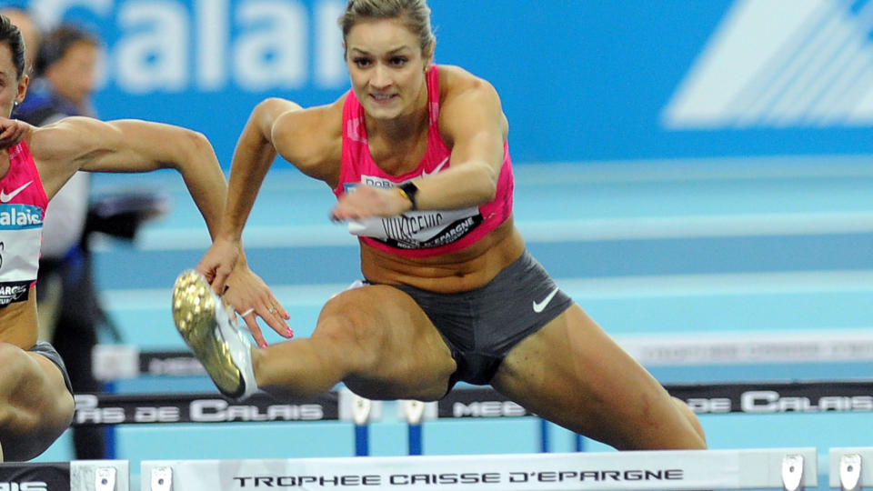 REKORDRASK: Christina Vukicevic senket nok en gang den norske rekorden p� 60 meter hekk da hun l�p p� 7,93 i franske Lievin.Foto: SCANPIX/AFP PHOTO/DENIS CHARLET