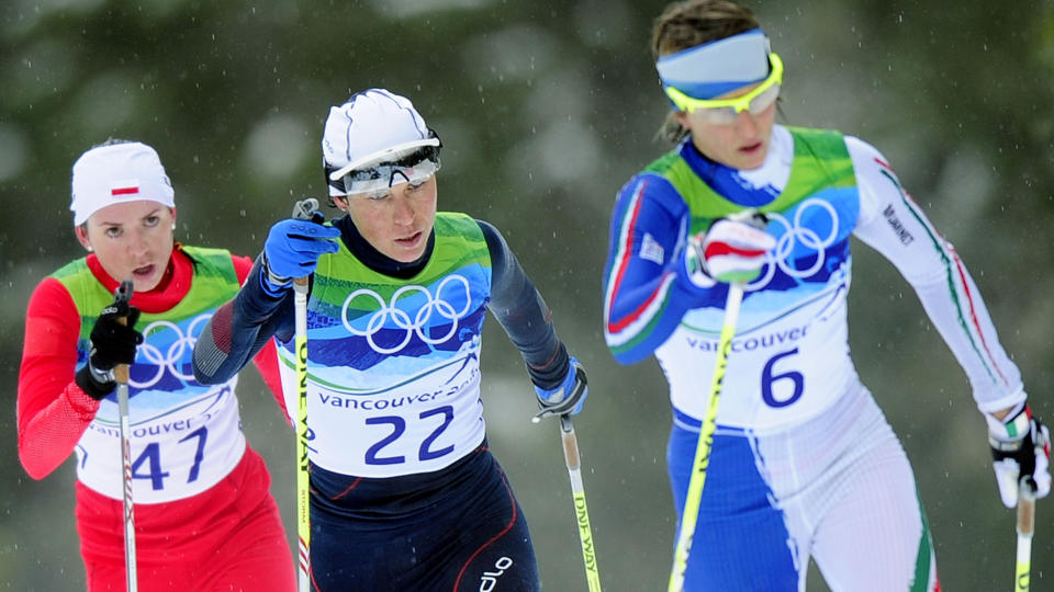 UFORST�ELIG? Cornelia Marek (t.v), her under 30 km i OL, har avlagt en positiv dopingtest. Foto: AFP/ALBERTO PIZZOLI