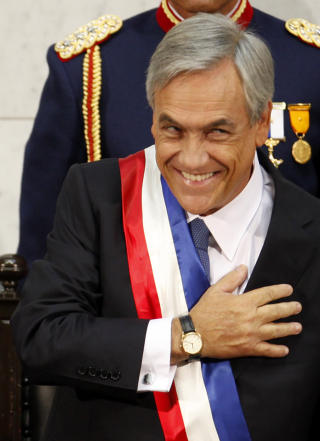 VOLDSOM OPPGAVE FORAN SEG: President Sebastian Pinera. Foto: AP Photo/Roberto Candia
