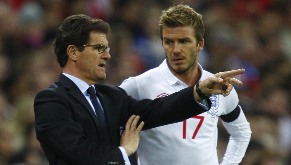 ST�TTESPILLER: Fabio Capello har fortalt David Beckham at han �nsker � ha med seg 34-�ringen til S�r-Afrika som en st�ttespiller og motivator.Foto: SCANPIX/REUTERS/ Eddie Keogh