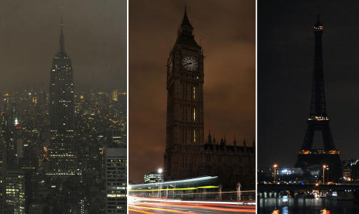 SLOKKET: New Yorks Empire State Building, Londons Big Ben og Paris' Eiffelt�rnet slokket - nesten alle - lysene under Earth Hour-markeringen i fjor. Foto: AFP