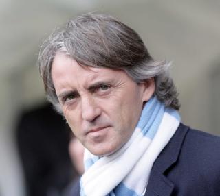 KLUBBHISTORIE: Roberto Mancini mener �rets byderby er skjebnesvangert for klubbens framtid. Foto: EPA/Steve Woods