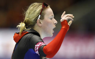 Norway's Maren Haugli reacts after her women's 3000 meters World Speed Skating Championships all round race at the Thialf Stadium in Heerenveen March 20, 2010.   REUTERS/Jerry Lampen (NETHERLANDS - Tags: SPORT SPEED SKATING)