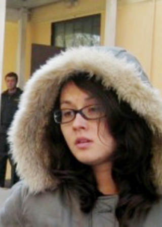 FENGSLET: Journalisten og redakt�ren Aygul Makhmutova (26) stanset et garasjeanlegg i bydelen sin gjennom avsl�rende journalistikk. N� sitter hun i fengsel, blant annet d�mt for � banke opp hele tre politimenn. Selv sier hun de fors�kte � voldta henne.