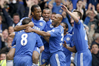 TOPPSCORER: Didier Drogba smilte igjen etter pause, og scoret hattrick.Foto: SCANPIX/AP/Sang Tan