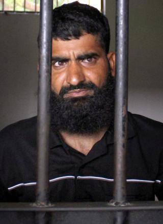 SKULLE STARTE EGEN BEDRIFT: Den mistenkte 30-�ringen, Faiz Mohammad, har i avh�r fortalt at han tidligere jobbet i byggebransjen i Oman og skulle tilbake for � starte eget byggefirma. Foto: EPA/SCANPIX