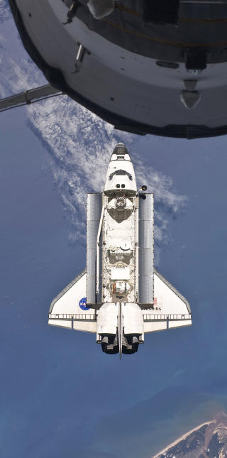 ATLANTIS HAR lagt til kai p� ISS for siste gang etter 25 �r i tjeneste. Foto: REUTERS/NASA/SCANPIX
