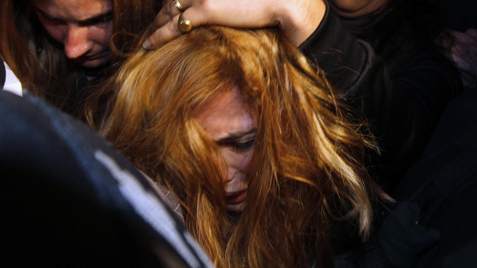 ARRESTERT: Angie Sanclemente Valencia (31) f�res bort av politiet i Argentina etter � ha blitt arrestert, mistenkt for � ha ledet en narkotikaring. Foto: REUTERS/Marcos Brindicci/SCANPIX