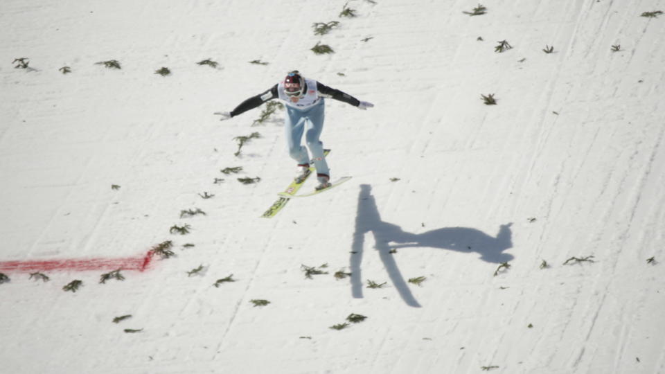 H�PER P� NY REKORD: Bj�rn Einar Rom�ren har hoppet 239 meter i Planica, n� h�per han p� 250 i Vikersund. Foto: Primoz Lovric / SCANPIX