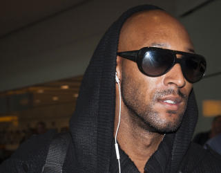 INGEN ANGRENDE SYNDER: Nicolas Anelka landet i dag hjemme i London etter � ha blitt kastet ut av den franske VM-troppen.Foto: SCANPIX/AFP PHOTO/Frantzesco Kangaris