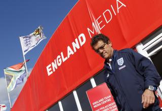 F�R SPARKEN?: Fabio Capello forlater en pressekonferanse i S�r-Afrila. Engelske medier spekulerer i om italieneren f�r fyken av FA. Foto: REUTERS/Darren Staples