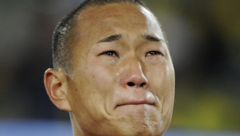 F�LELSESLADD VM: Nord-Korea-spiss Jong Tae-se gr�t sine stolte t�rer under nasjonalsangen i gruppe�pningskampen mot Brasil. Hvilket annet VM har Nord-Korea ogs� deltatt i? FOto: Stephane De Sakutin / AFP.