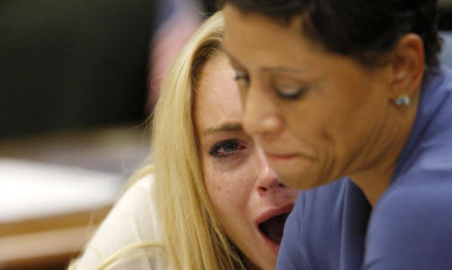 ER DET SANT?!! Lindsay Lohan reagerer kraftig p� fengselsdommen. Foto: REUTERS/David McNew/Pool