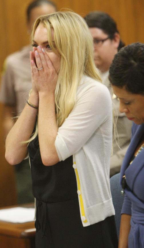 SKULKET AVVENNING: N� m� Lindsay Lohan i fengsel. Foto: EPA/DAVID MCNEW