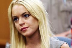 Lindsay Lohan is shown in a court, Tuesday, July 20, 2010, in Beverly Hills, Calif., where she was taken into custody to serve a jail sentence for probation violation. (AP Photo/Al Seib, pool)
