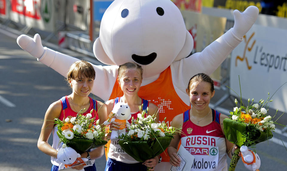 RUSSISK STORESLEM: Olga Kaniskina (midten, Anisja Kirdjapkina (t.v.)  og Vera Sokolova (t.h.) s�rget for helrussisk seierspall p� 20 kilometer kappgang.Foto: SCANPIX