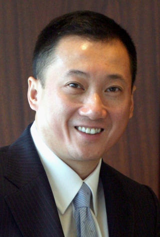 SERI�S: Kenny Huang tas p� alvor som en mulig ny eier av Liverpool. Foto: REUTERS