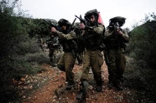�VELSER: Israelske forsvarsstyrker i en �velse p� Golanh�yden, omr�det Israel har okkupert av Syria siden 1967. Foto: SCANPIX/PA/IDF/HO