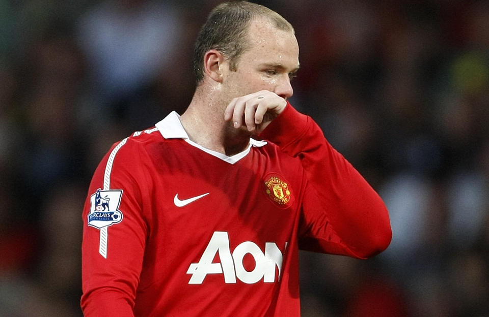 INNR�MMER INGENTING: I en uttalelse publisert i kveld verken bekrefter eller avkrefter Wayne Rooney utroskapshistoriene som har kommet fram den siste uka. Men han sier flere av historiene er upresise og uriktige. Foto: AP Photo/Tim Hales