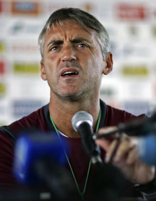 IMPONERT: Roberto Mancini mener City har f�tt en av verdens beste spisser i Balotelli. Foto:  REUTERS/Adi Piclisan