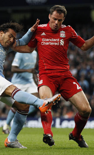 TRO TJENESTE: Jamie Carragher har bare spilt for Liverpool. Men som guttunge holdt han med Everton. Foto: REUTERS/Phil Noble