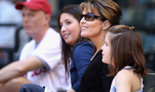 MED FAMILIEN: Sarah Palin har fem barn, her p� baseballkamp. Foto: AFP