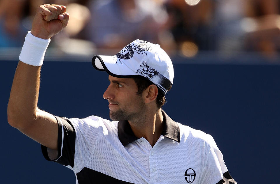 KOMFORTABEL SEIER: Novak Djokovic tok en komfortabel seier i strake sett mot amerikaneren Mardy Fish i �ttedelsfinalen av US Open.Foto: SCANPIX/Matthew Stockman/Getty Images/AFP