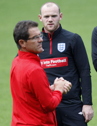 TRENERST�TTE: Englands landslagssjef Fabio Capello lovet i f�r Wayne Rooney en plass i startelleveren. Foto: MICHAEL PROBST/AP