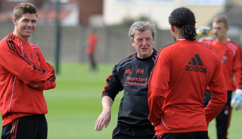 VIL SLANKE STALLEN YTTERLIGERE: Liverpool-manager Roy Hodgson er enn� ikke tilfreds med sammensetningen av spillertroppen, og varsler ytterligere nedskj�ringer. Klubbkaptein Steven Gerrard (t.v.) og landslagsback Glen Johnson b�r imidlertid f�le seg trygge.Foto: SCANPIX/AFP PHOTO/ Andrew Yates