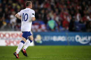 SCORET TIRSDAG: Wayne Rooney virket ikke preget av skandalen da han spilte og scoret ett m�l mot Bulgaria for England tirsdag. Foto: AFP/FABRICE COFFRINI