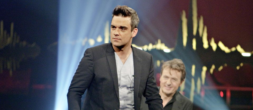 GAMLE KJENTE: Robbie Williams har for vane og kuppe showet n�r han er gjest hos Fredrik Skavlan. N� kan det v�re duket for uforutsette hendelser i programmet igjen, n�r den nygifte popsangeren kommer p� bes�k til Fredrik Skavlan i h�st. 
Foto: Lars Eivind Bones / Dagbladet