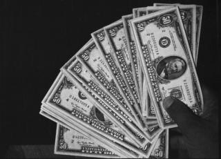 DET OMSTRIDTE PENGEBEVISET: En tidligere POT-ansatt hevdet i forrige uke til Aftenposten at �rnulf Tofte gikk i banken for � l�ne dollar til � lage dette pengebeviset. Foto: PST/under en Creative Commons-lisens
