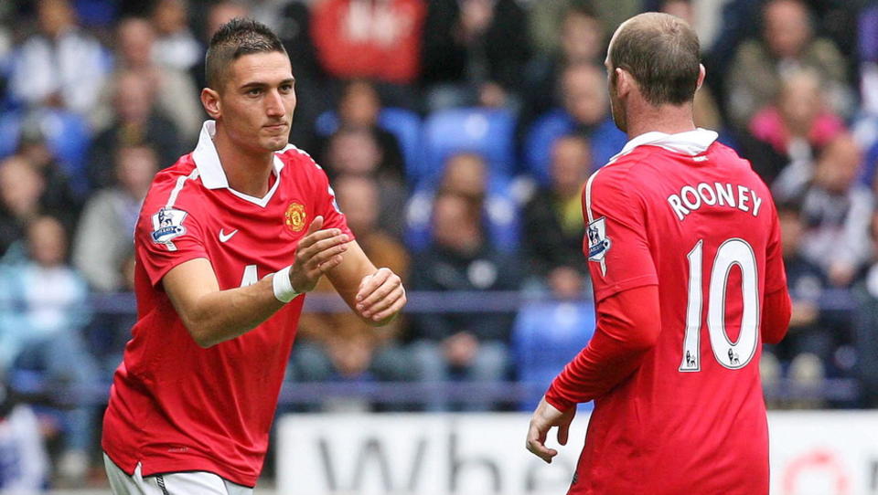 M�TTE UT: Wayne Rooney ble erstattet av Federico Macheda under kampen mot Bolton i g�r. Foto: Lindsey Parnaby, EPA/Scanpix