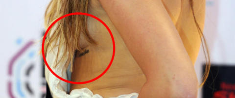 Dette betyr Mileys brysttatovering