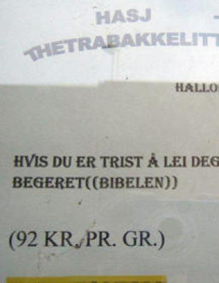 Reklamerte for hasjsalg med plakat i vinduet