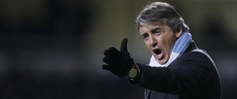 Sammenligner Mancini med Ferguson