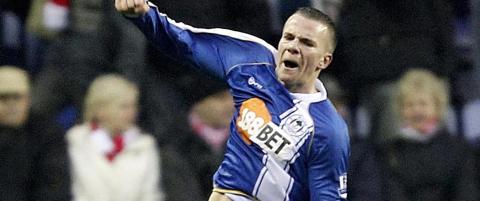 Wigan kjempet seg over streken