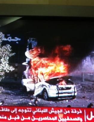 Al Jazeera-bil i flammer under voldelig protest