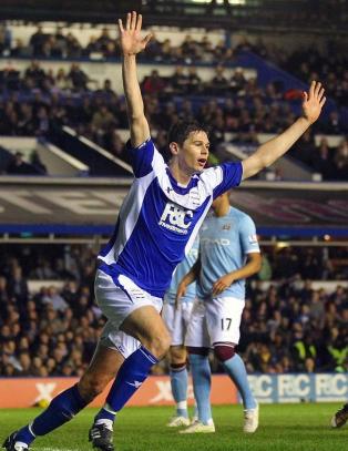 Zigic nikket Birmingham over streken