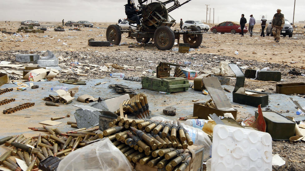 OPPR�RERE: Kadhafis motstandere har hatt kontrollen i Ras Lanuf, men dikatorenes styrker pr�ver n� � ta byen tilbake. Foto: REUTERS/Goran Tomasevic/Scanpix