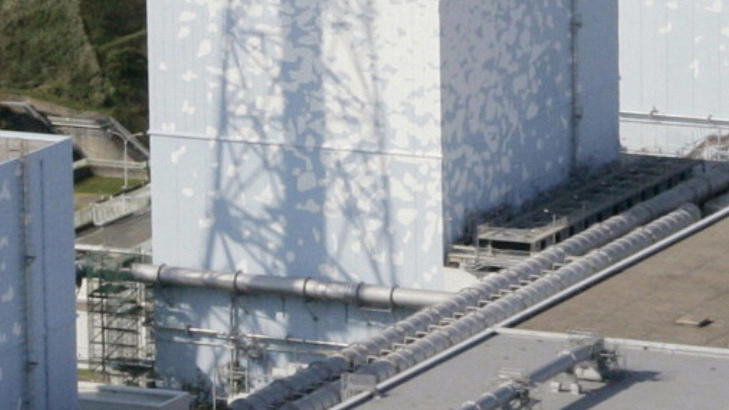 NY EKSPLOSJONSFARE: Ogs� ved reaktor nummer 3 i Fukushima Daiichi-kraftverket, som har problemer med n�dkj�leanlegget, kan det komme til � eksplodere, advarer japanske myndigheter s�ndag. FOTO: REUTERS / Kyodo / SCANPIX