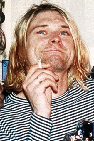 D�D: Nirvana-frontfigur Kurt Cobain i 1993, �ret f�r han tok sitt eget liv. Foto: Mark J.Terrill/AP/Scanpix