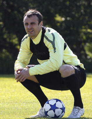 Berbatov er ikke med i United-troppen